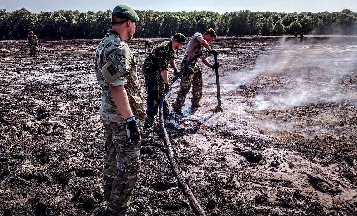 Soldater fra Hjemmeværnet var med til at bekæmpe branden i Lille Vildmose i juli 2018. Foto: Hung Van Plungklang Nguyen.
